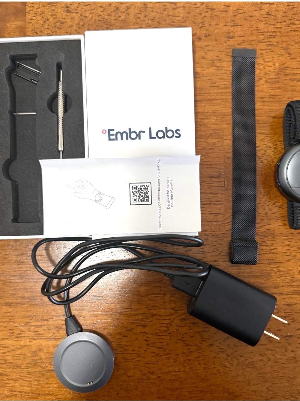 Black Wearable Thermal Device with Charging Dock